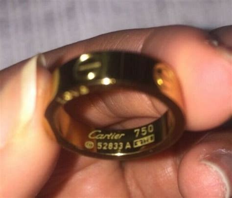 cartier 750 ring 52833a worth|cartier 750 ring 52833a real or fake.